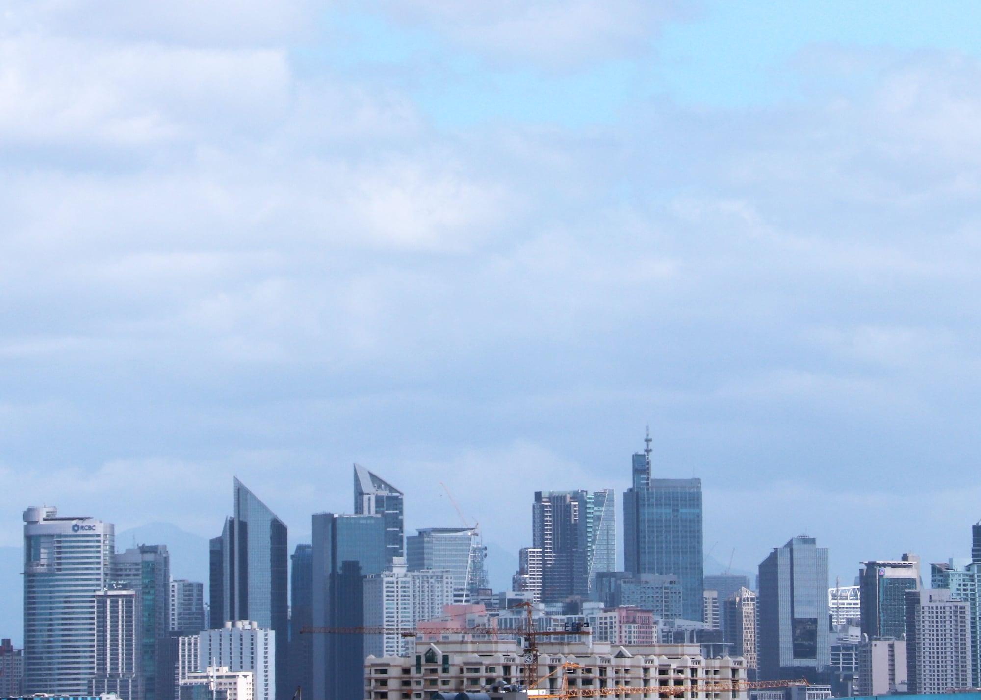 马尼拉康莱德酒店 帕赛 外观 照片 The skyline of Abu Dhabi